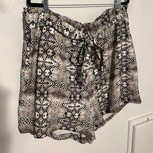 Snakeskin print paper bag Eloquii shorts with tie belt.